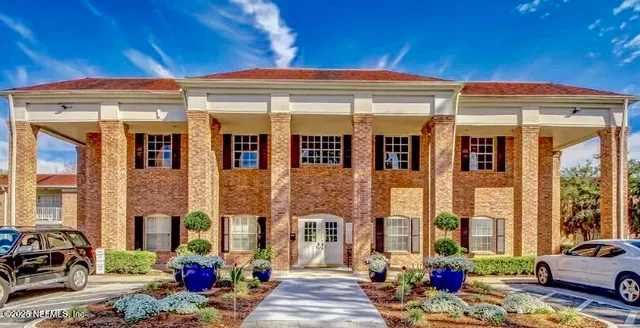 a view of a building with glass windows