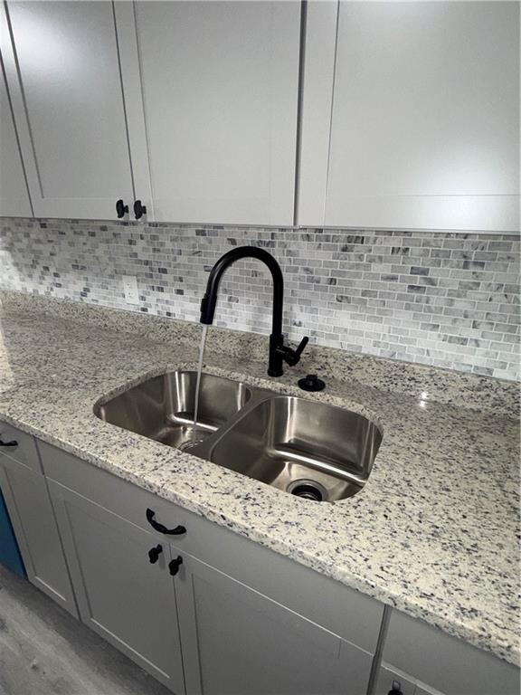 1418 East 10th Street West Point, GA 31833 - Photo 14 of 31 a close view of sink and tap