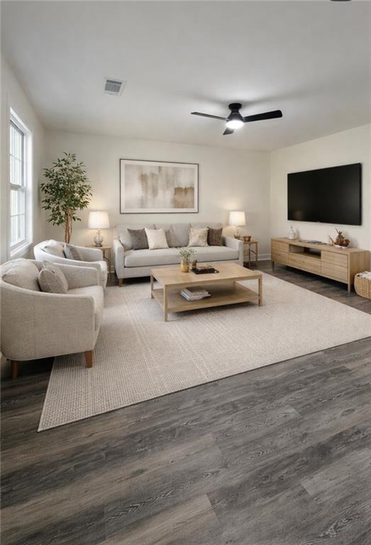 1418 East 10th Street West Point, GA 31833 - Photo 6 of 31 a living room with furniture and a flat screen tv