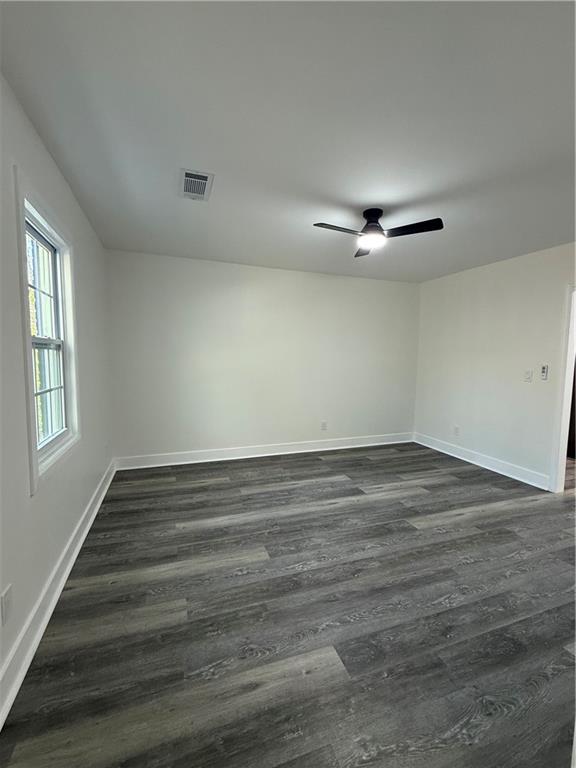 1418 East 10th Street West Point, GA 31833 - Photo 7 of 31 a view of a room with wooden floor