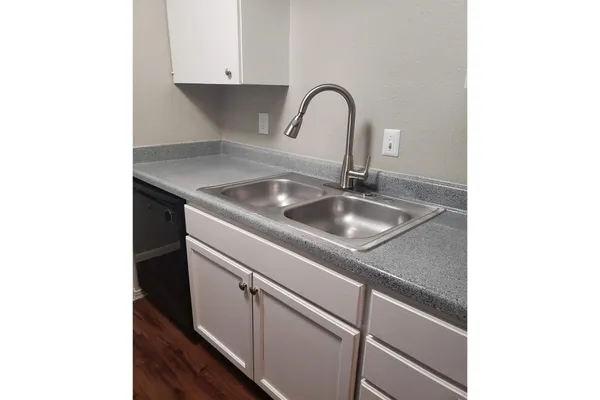 a kitchen with a stove and a microwave
