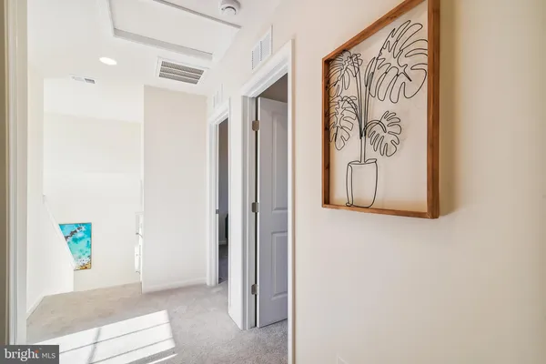 a view of front door with wooden floor