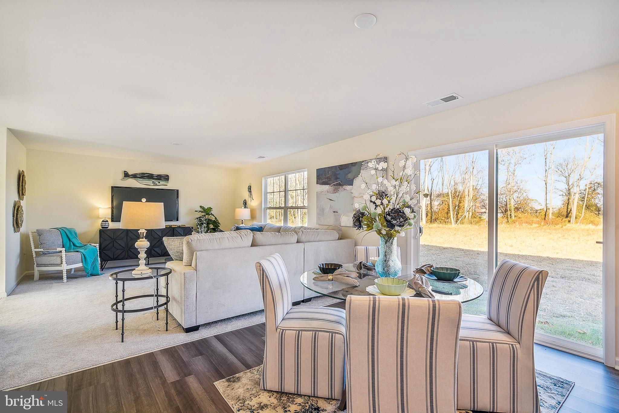 9716 Camp Road Laurel, DE 19956 - Photo 4 of 25 a view of a dining room with furniture window and outside view