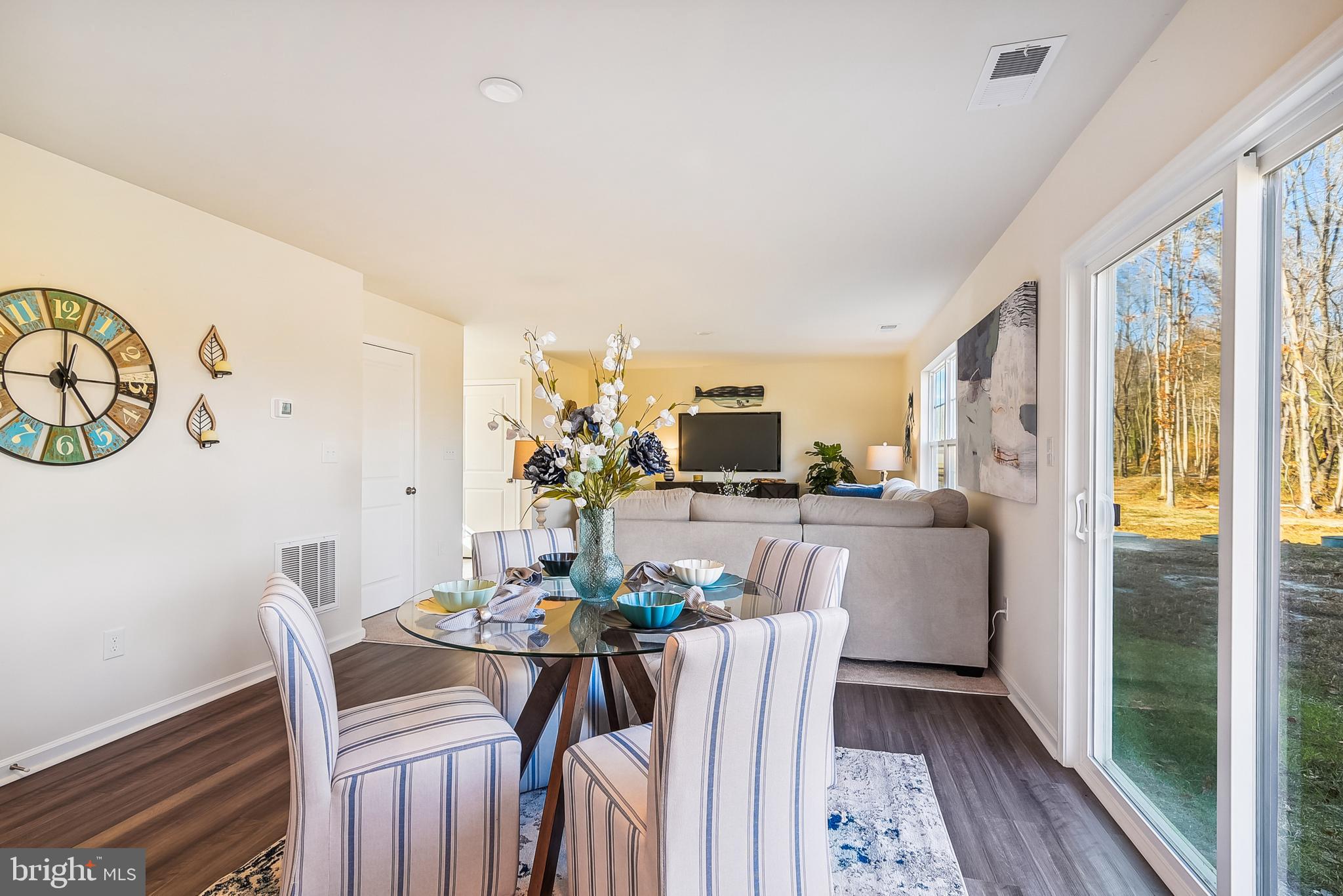 9716 Camp Road Laurel, DE 19956 - Photo 5 of 25 a view of a dining room with furniture window and wooden floor