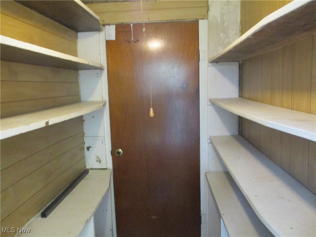 15401 A Madison Road Middlefield, OH 44062 - Photo 14 of 17 Walk thru pantry leads to basement steps