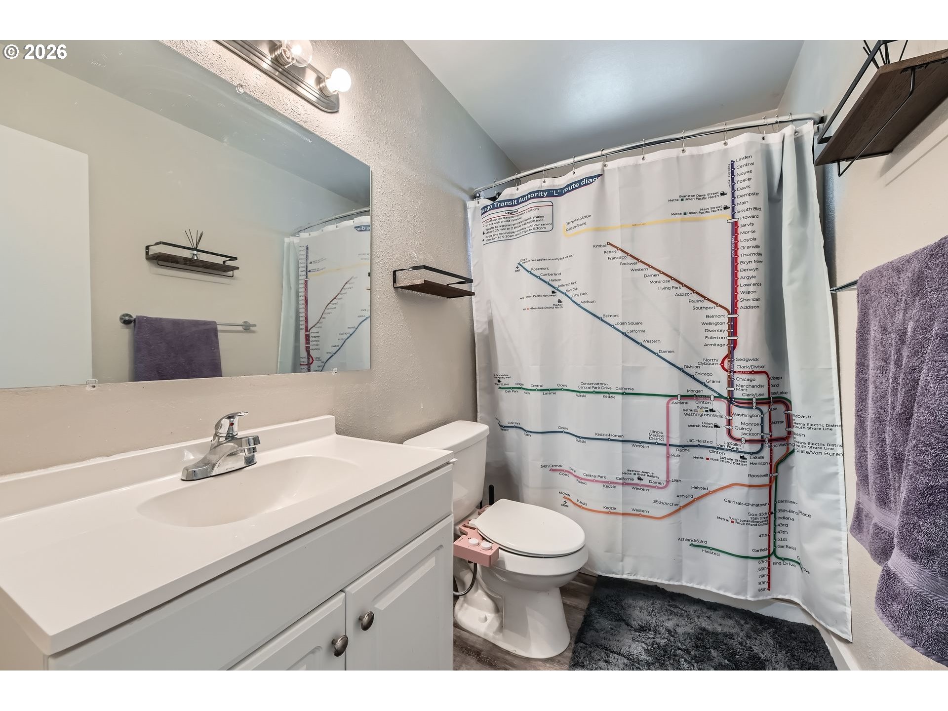 1643 Northeast 74th Avenue Portland, OR 97213 - Photo 13 of 24 a bathroom with a sink toilet a mirror and shower