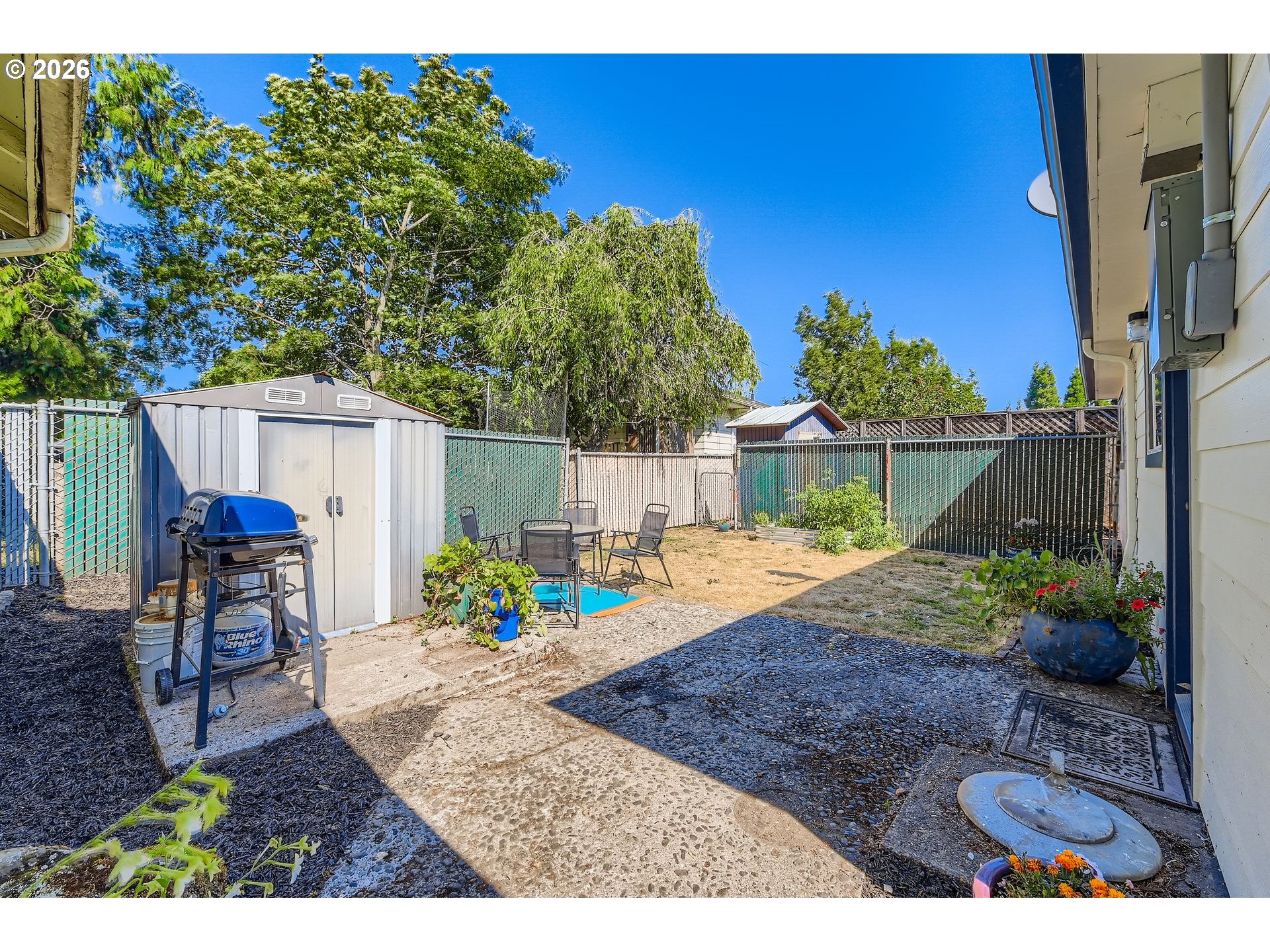 1643 Northeast 74th Avenue Portland, OR 97213 - Photo 17 of 24 a view of a backyard with sitting area