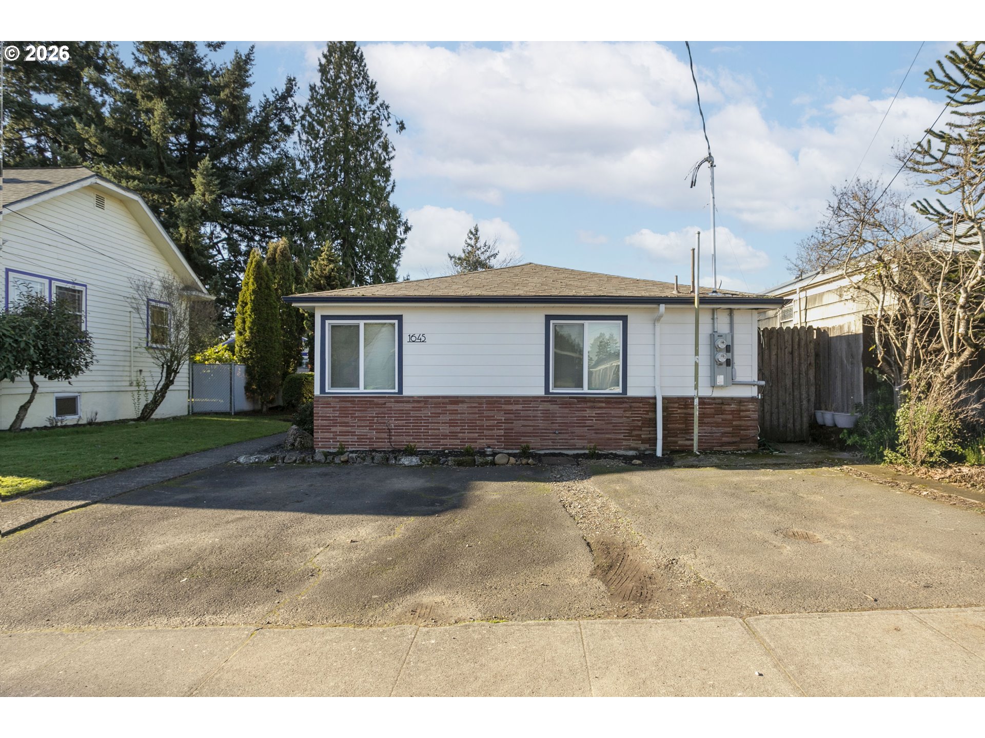 1643 Northeast 74th Avenue Portland, OR 97213 - Photo 2 of 24 a view of a house with a yard