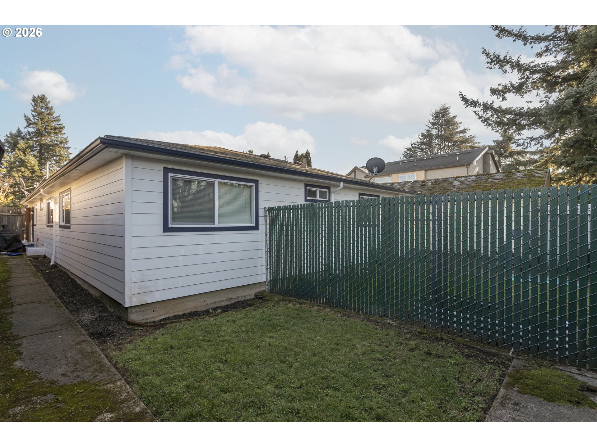 1643 Northeast 74th Avenue Portland, OR 97213 - Photo 21 of 24 a view of a backyard with a garden