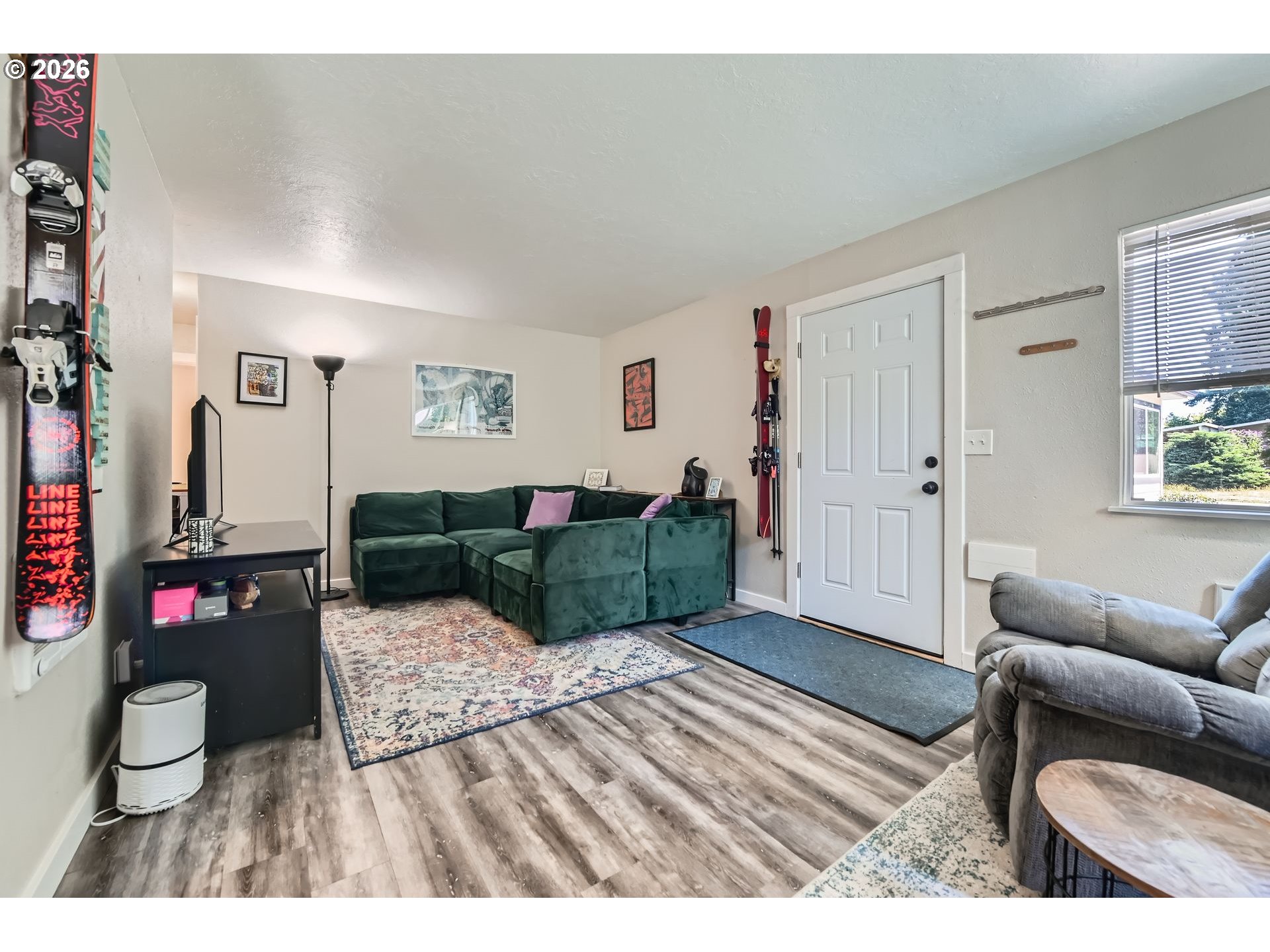 1643 Northeast 74th Avenue Portland, OR 97213 - Photo 6 of 24 a living room with furniture and a wooden floor