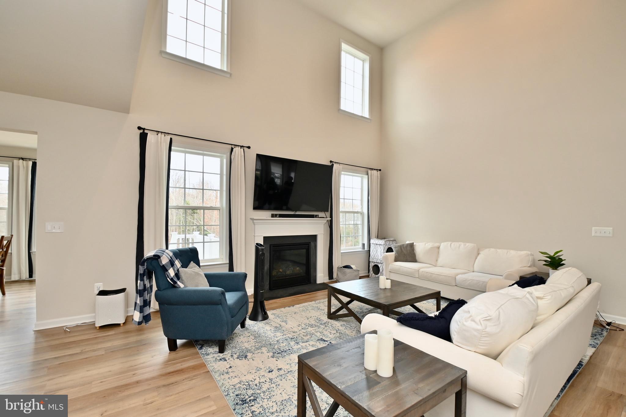 6603 Timber Ridge Lane Bryans Road, MD 20616 - Photo 21 of 55 Two Story Family room with gas fireplace