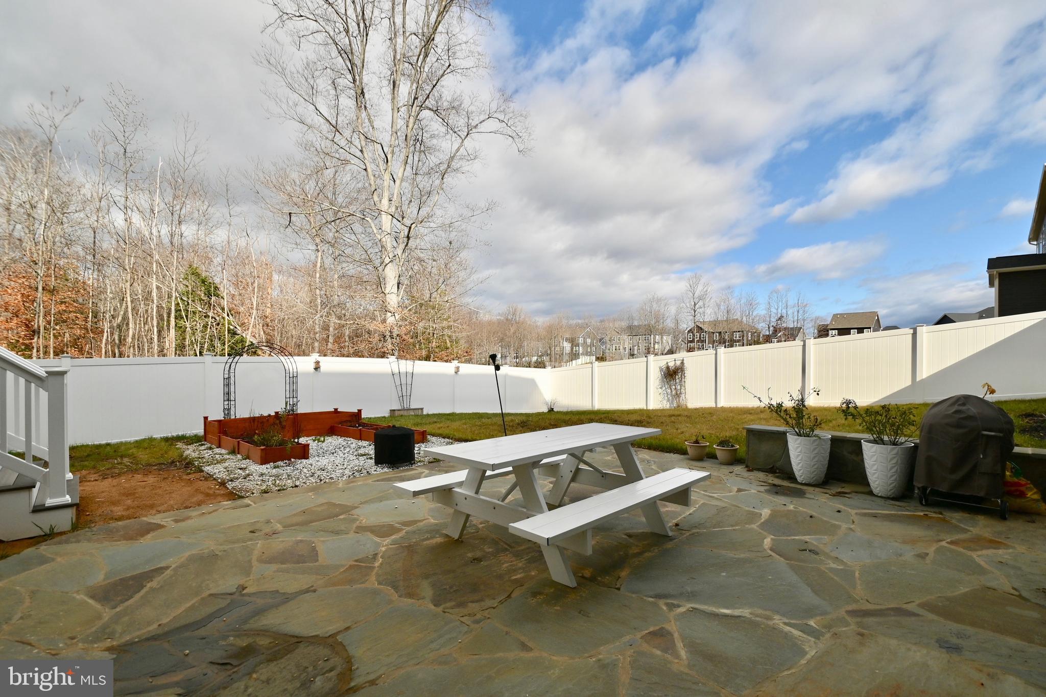 6603 Timber Ridge Lane Bryans Road, MD 20616 - Photo 51 of 55 Rear fenced yard with slat stone
