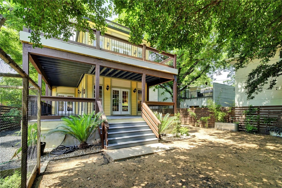 a view of a chair and table in the patio