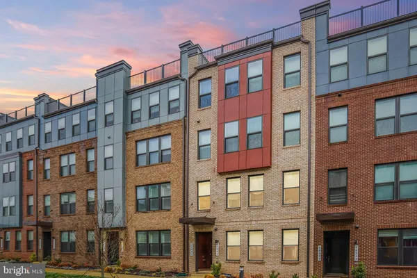 a front view of a building with glass windows