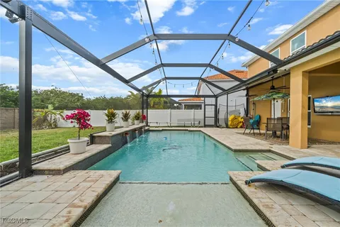 a view of a swimming pool with a porch