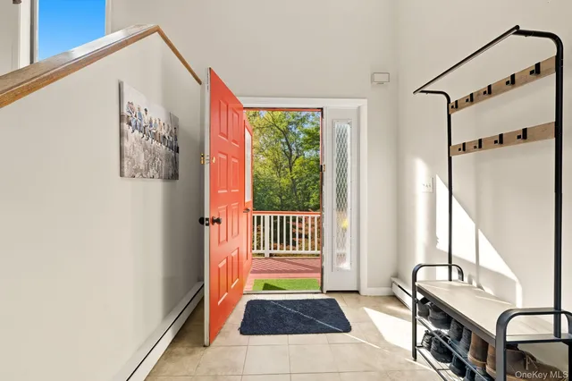 a view of front door with furniture