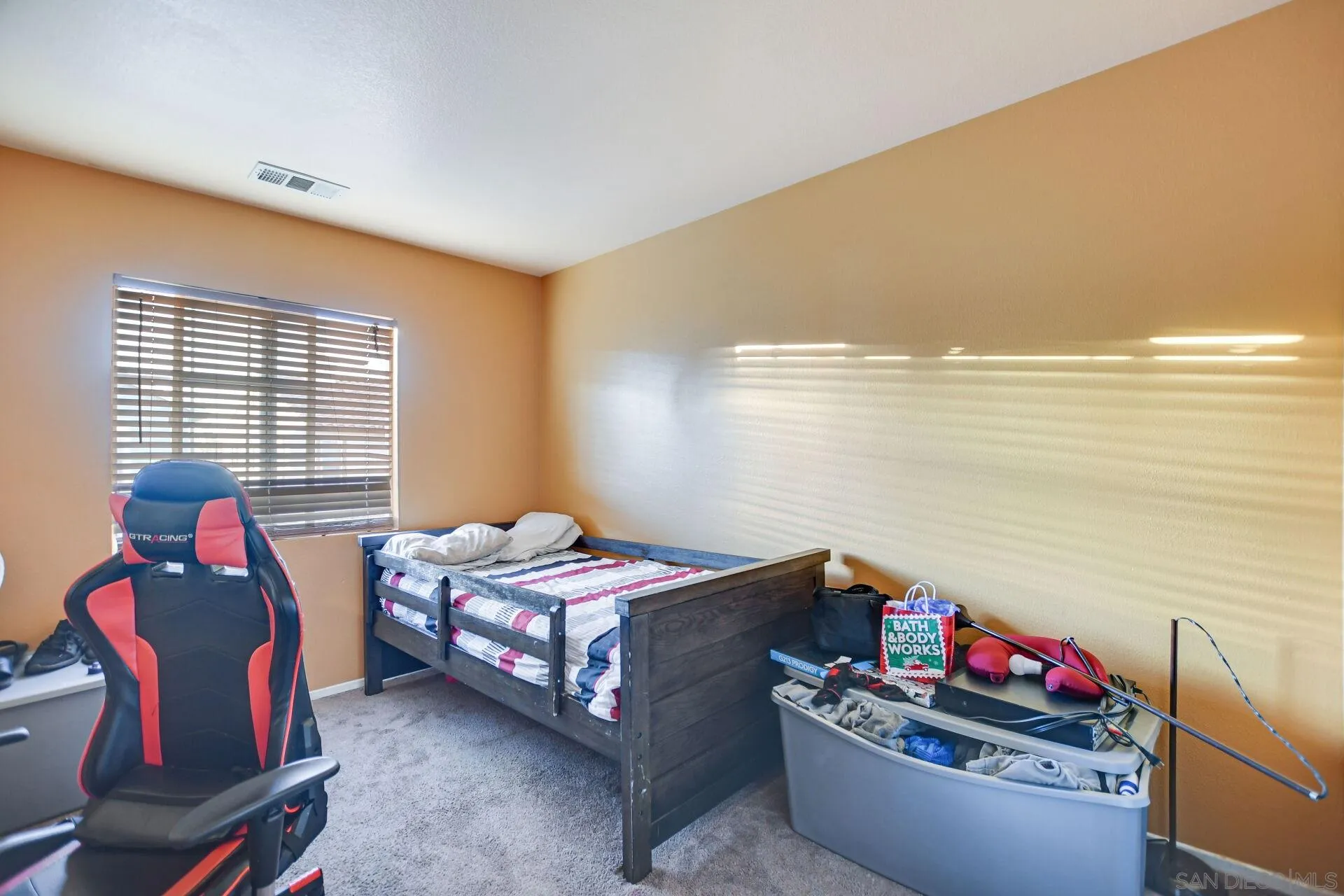 6346 Southern Place Riverside, CA 92504 - Photo 23 of 33 a bedroom with bed and a window