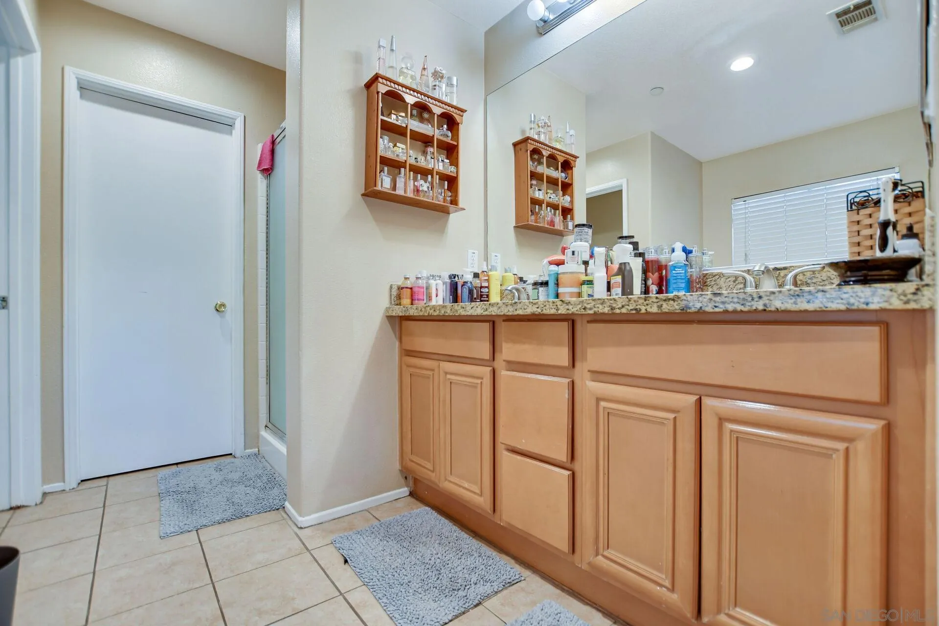 6346 Southern Place Riverside, CA 92504 - Photo 26 of 33 a kitchen with stainless steel appliances a refrigerator and cabinets