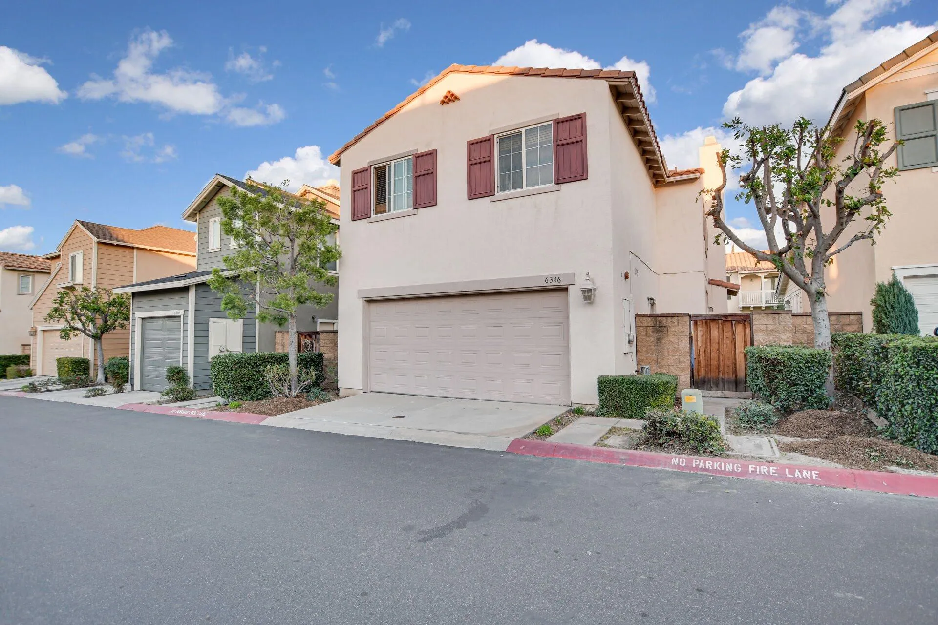 6346 Southern Place Riverside, CA 92504 - Photo 6 of 33 a front view of a house with a yard and garage