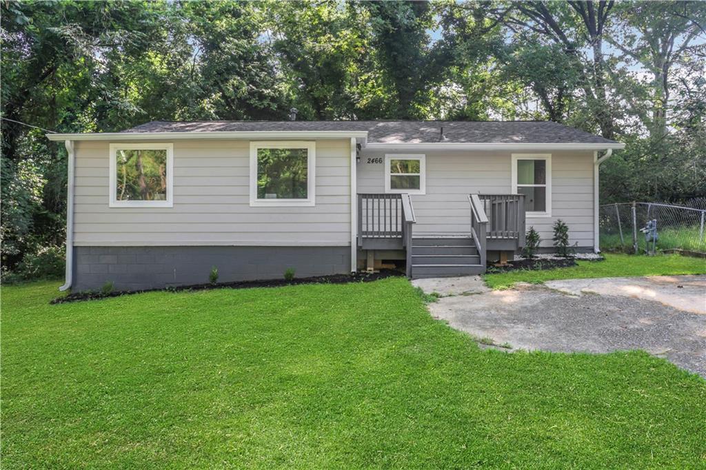 front view of house with a yard