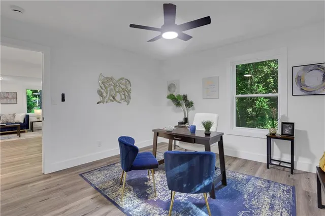 a living room with furniture and a window