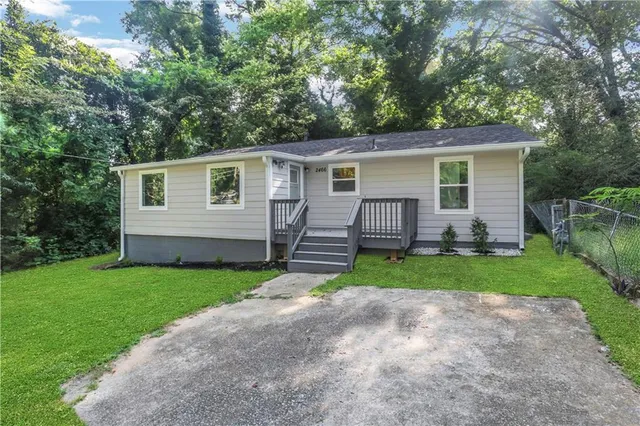 front view of a house and a yard