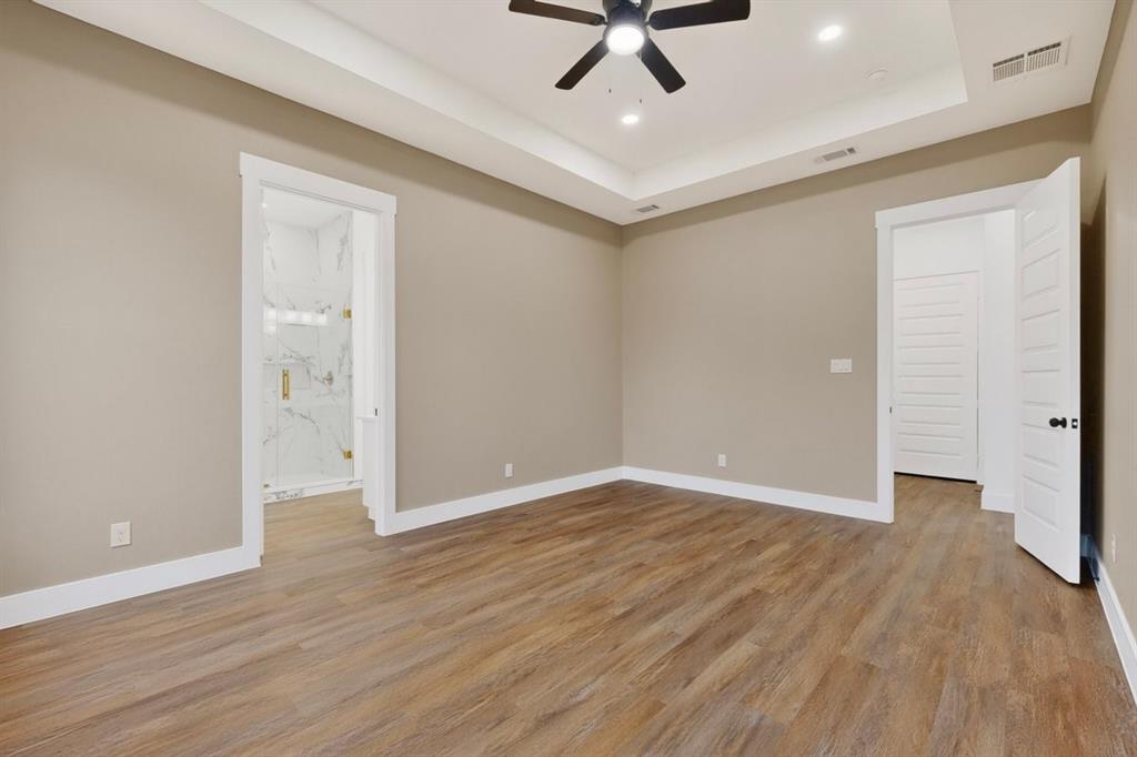 4737 Pine Ridge Court Athens, TX 75752 - Photo 10 of 26 wooden floor in an empty room with a window