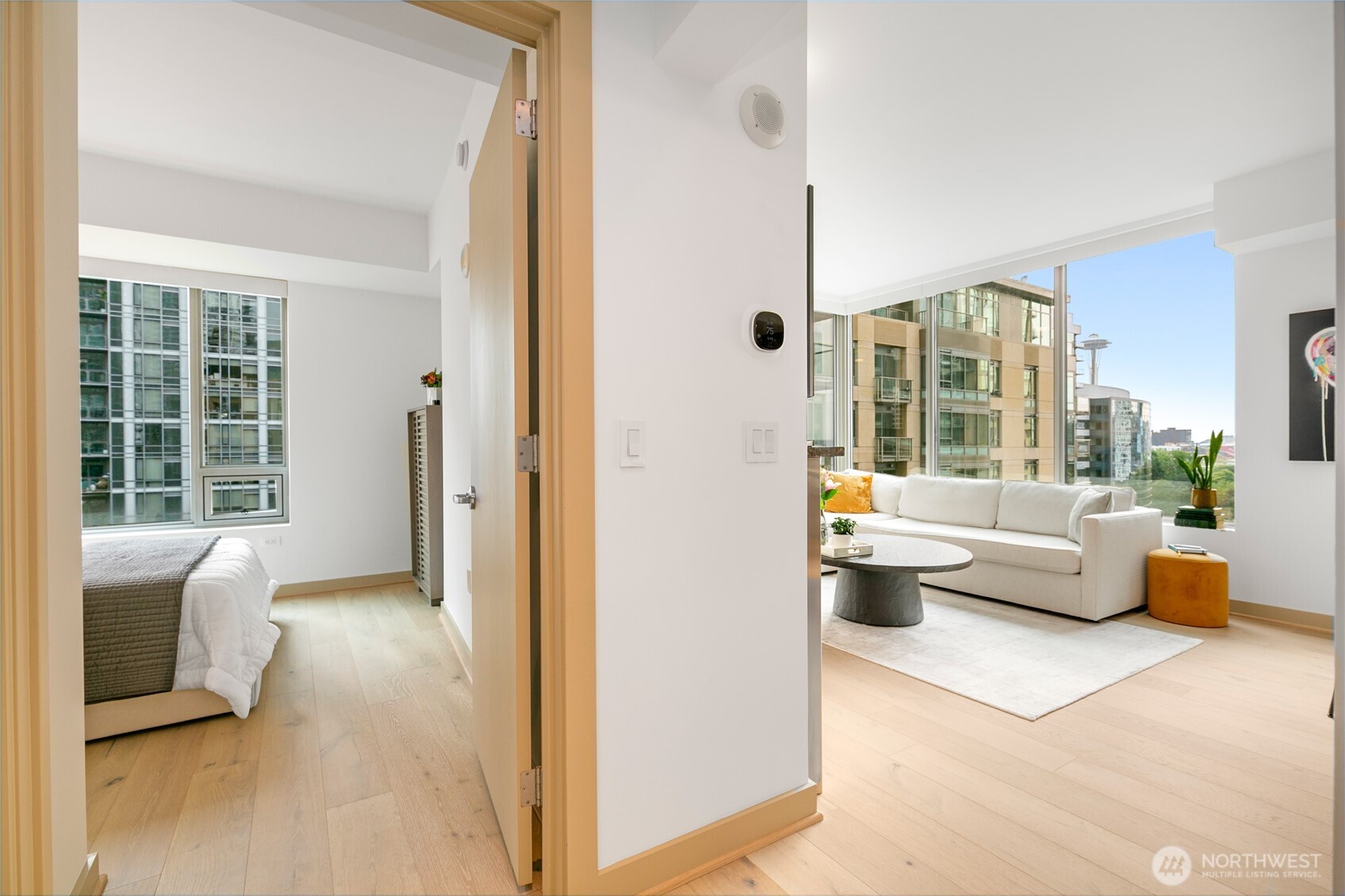 910 Lenora Street, Unit S1009 Seattle, WA 98121 - Photo 15 of 35 a view of living room filled with furniture and large window