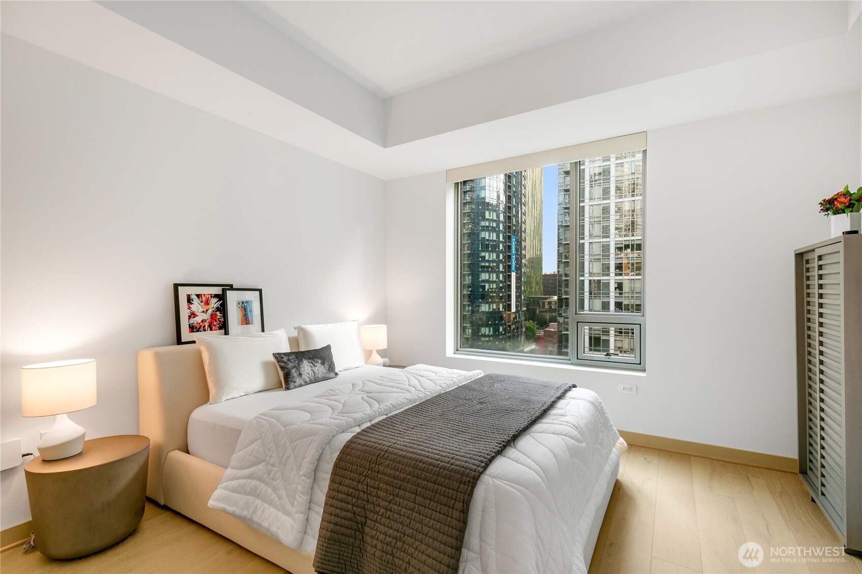 910 Lenora Street, Unit S1009 Seattle, WA 98121 - Photo 16 of 35 a bedroom with a bed and a window