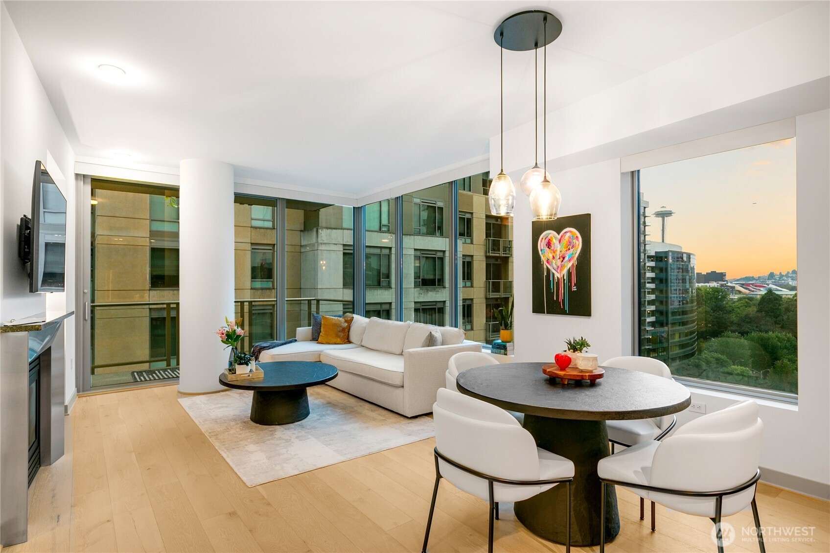 910 Lenora Street, Unit S1009 Seattle, WA 98121 - Photo 25 of 35 a view of a dining room and hall with furniture