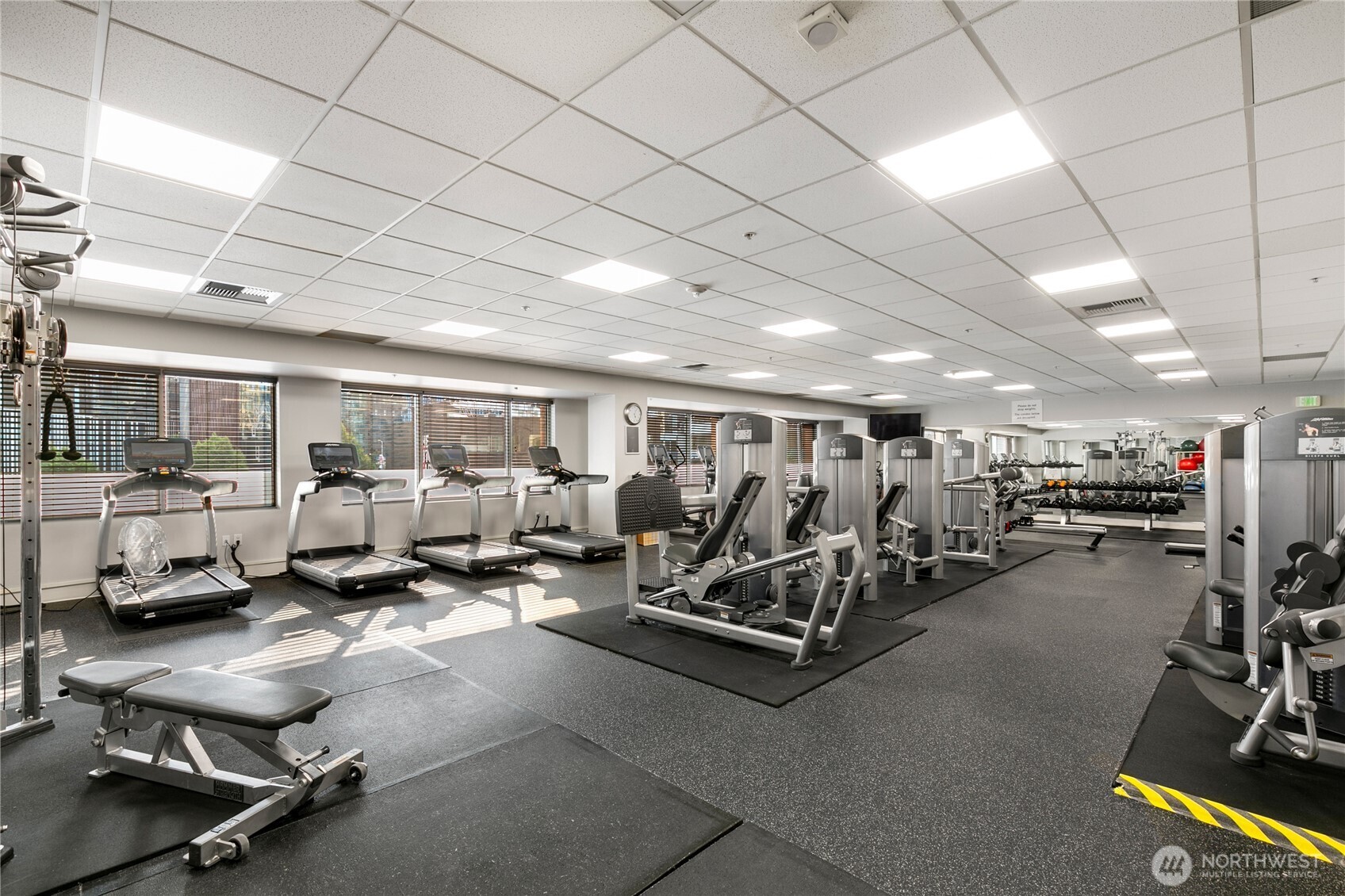 910 Lenora Street, Unit S1009 Seattle, WA 98121 - Photo 31 of 35 a view of a room with gym equipment