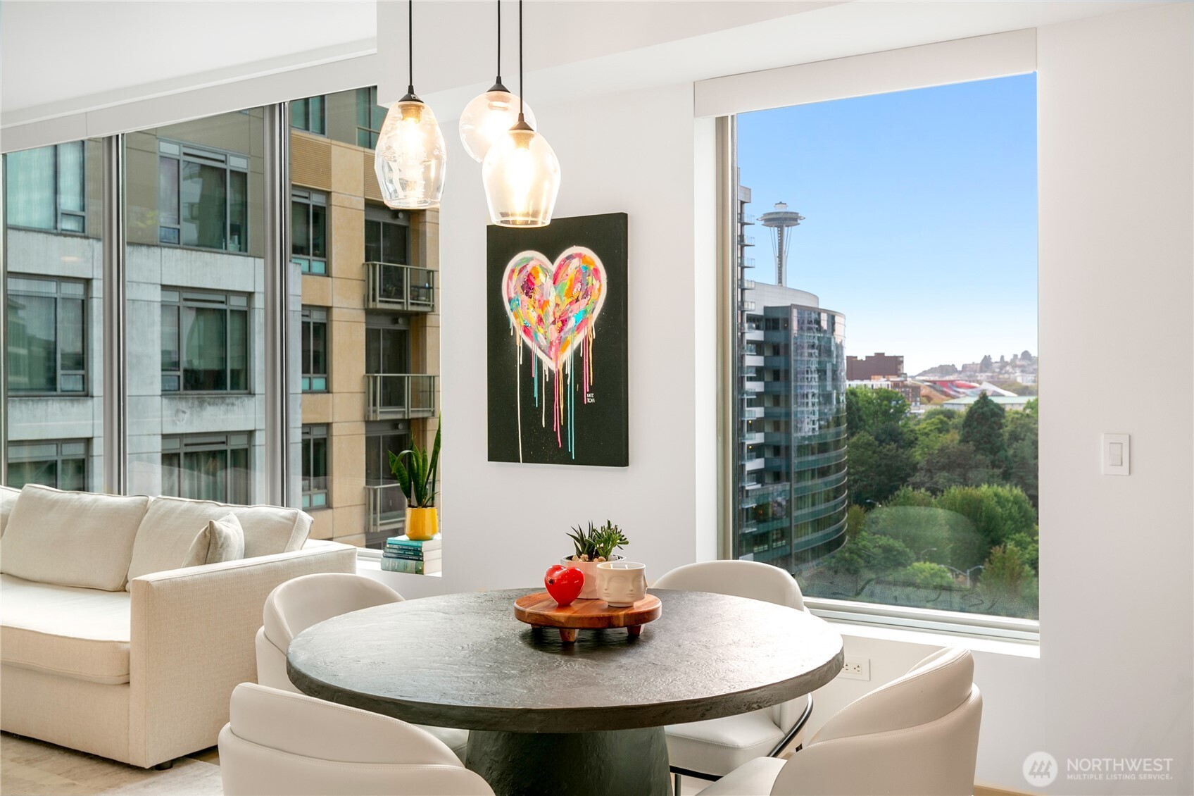 910 Lenora Street, Unit S1009 Seattle, WA 98121 - Photo 8 of 35 a dining room with furniture and window