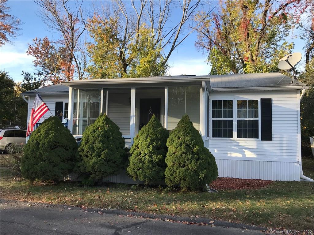 80 Cheyenne Road East Hartford, CT 06118 - Photo 1 of 1 a front view of a house with garden