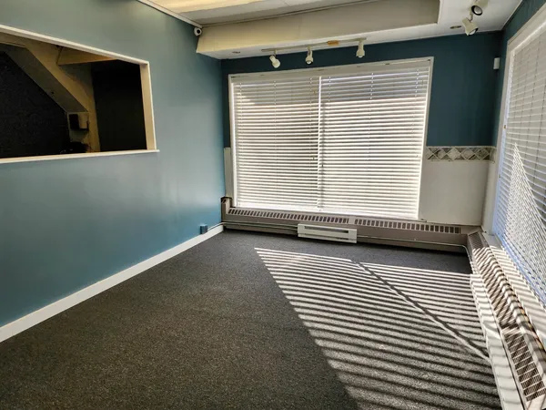a view of a hallway with washer and dryer