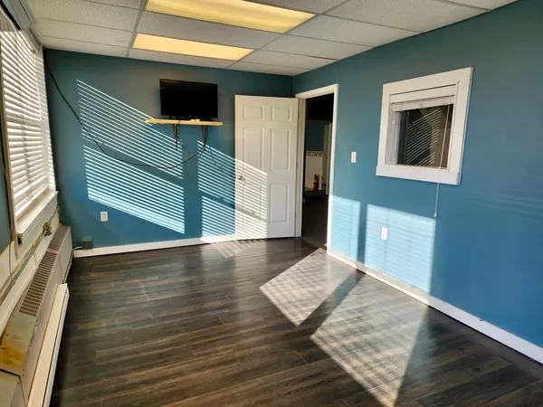 en empty room with windows