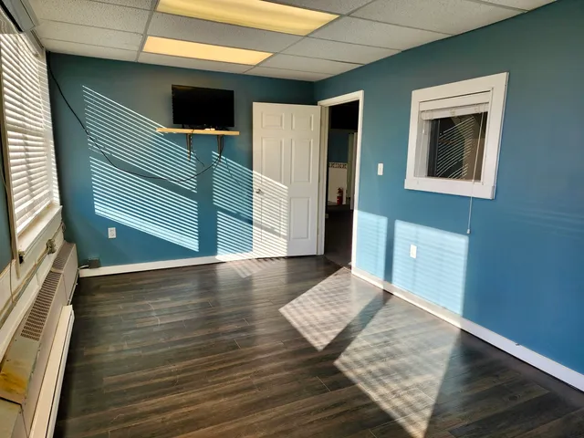 en empty room with windows