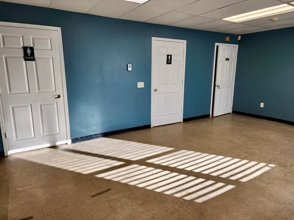 an empty room with windows