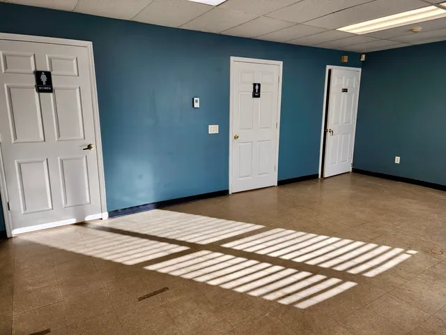 an empty room with windows