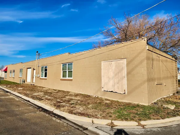 a view of a backyard of a house