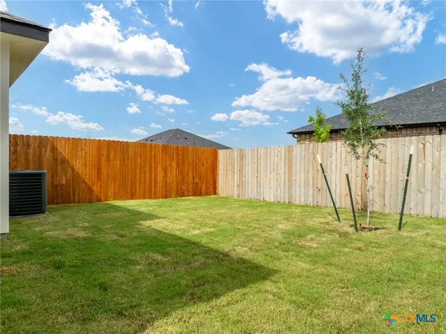 a view of an outdoor space and a yard
