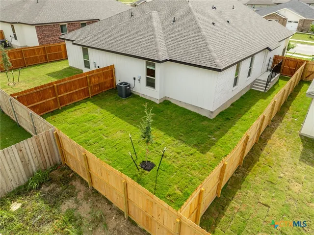 a view of a balcony with floor to ceiling windows