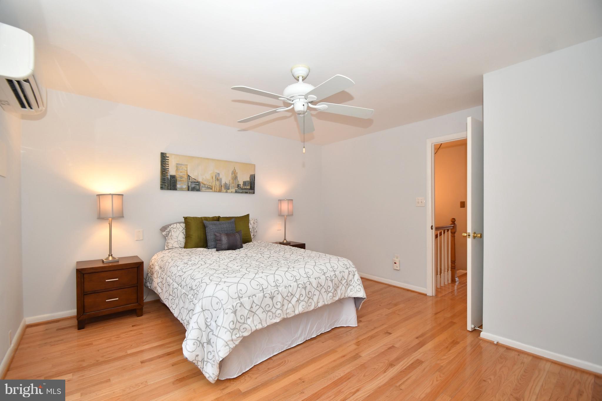 2103 Laurel Brook Road Fallston, MD 21047 - Photo 20 of 30 a bedroom with a bed and a ceiling fan