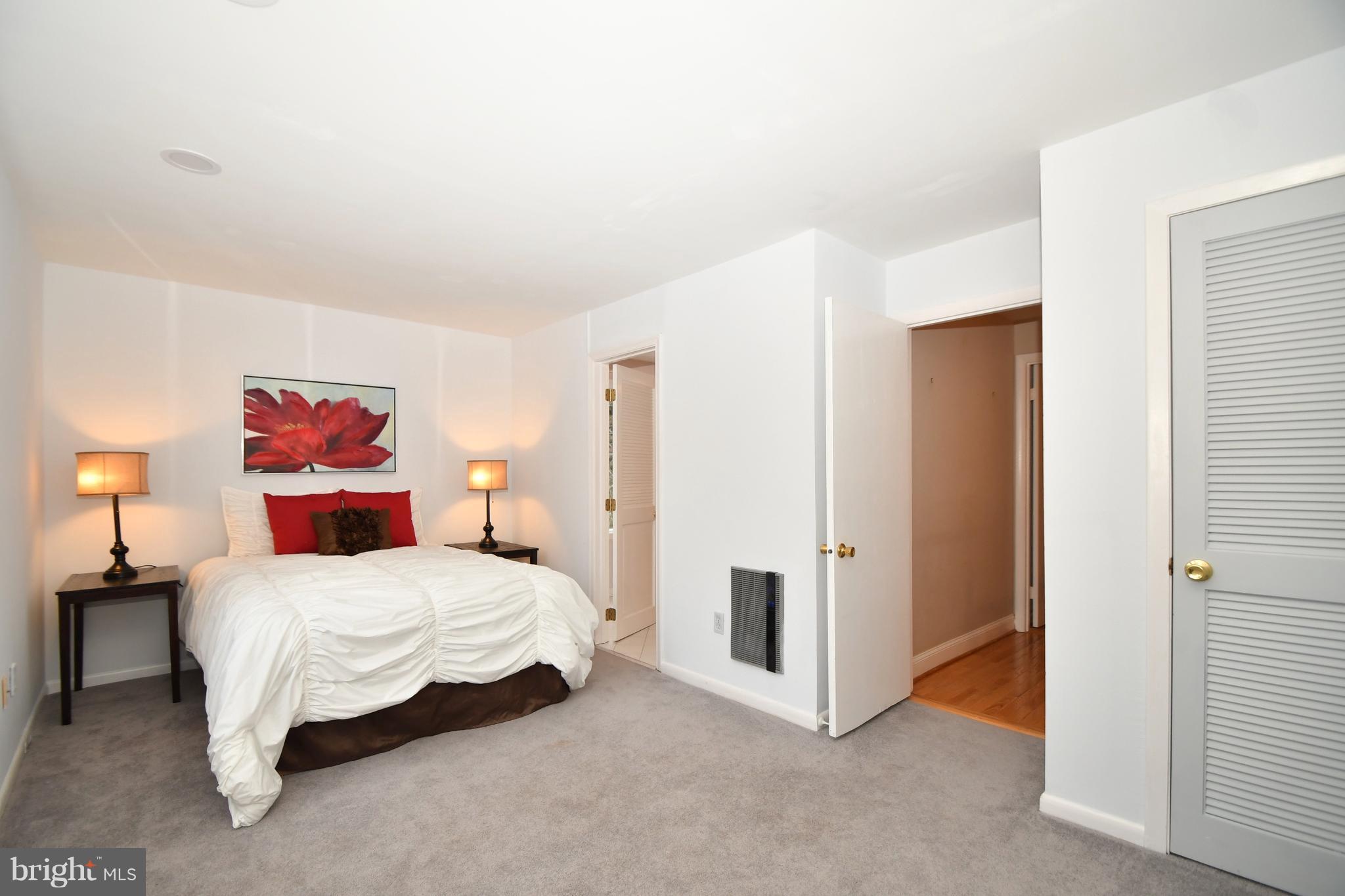 2103 Laurel Brook Road Fallston, MD 21047 - Photo 22 of 30 a bedroom with a bed and a painting on the wall