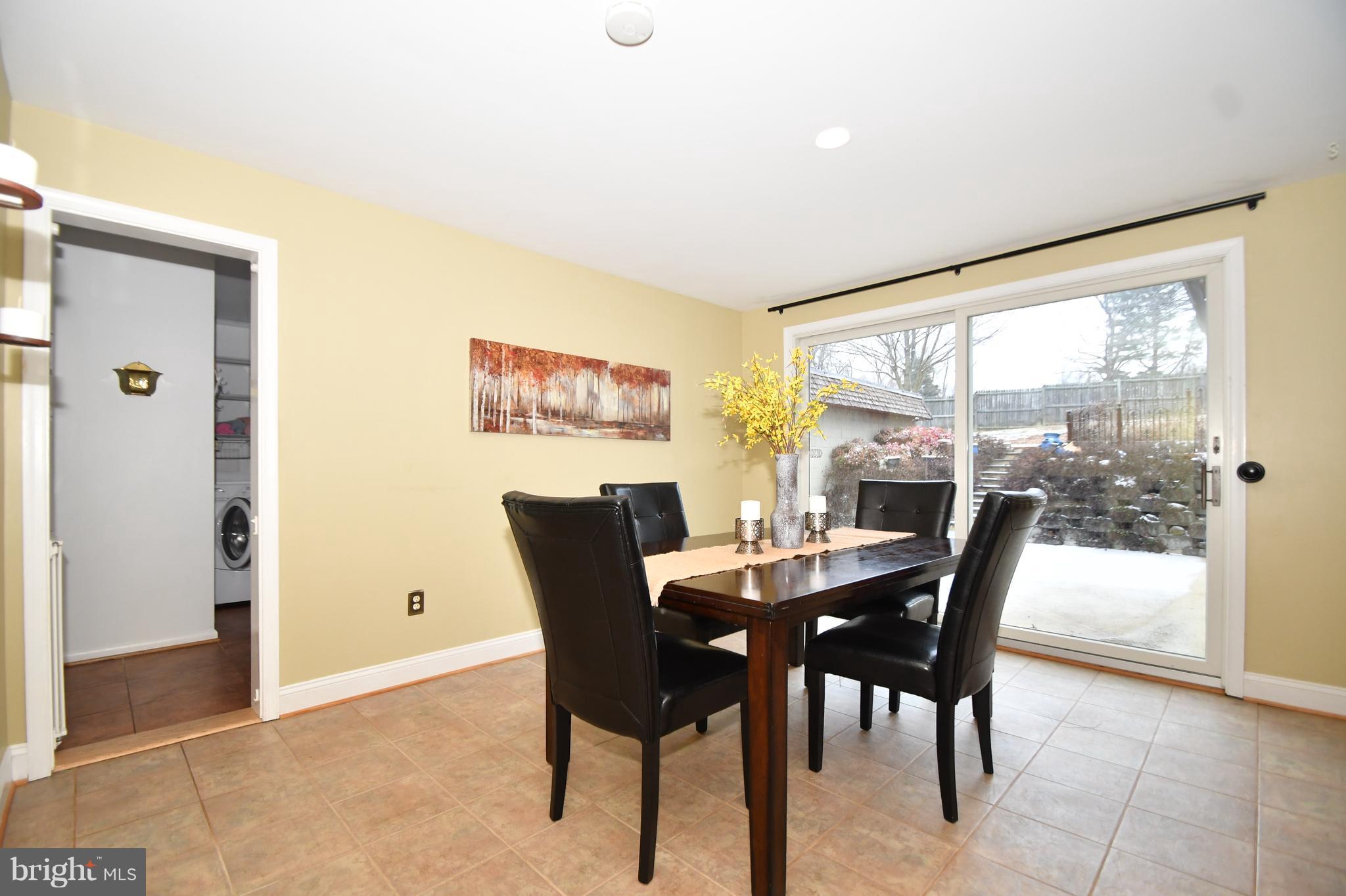 2103 Laurel Brook Road Fallston, MD 21047 - Photo 8 of 30 a view of a dining room with furniture window and outside view
