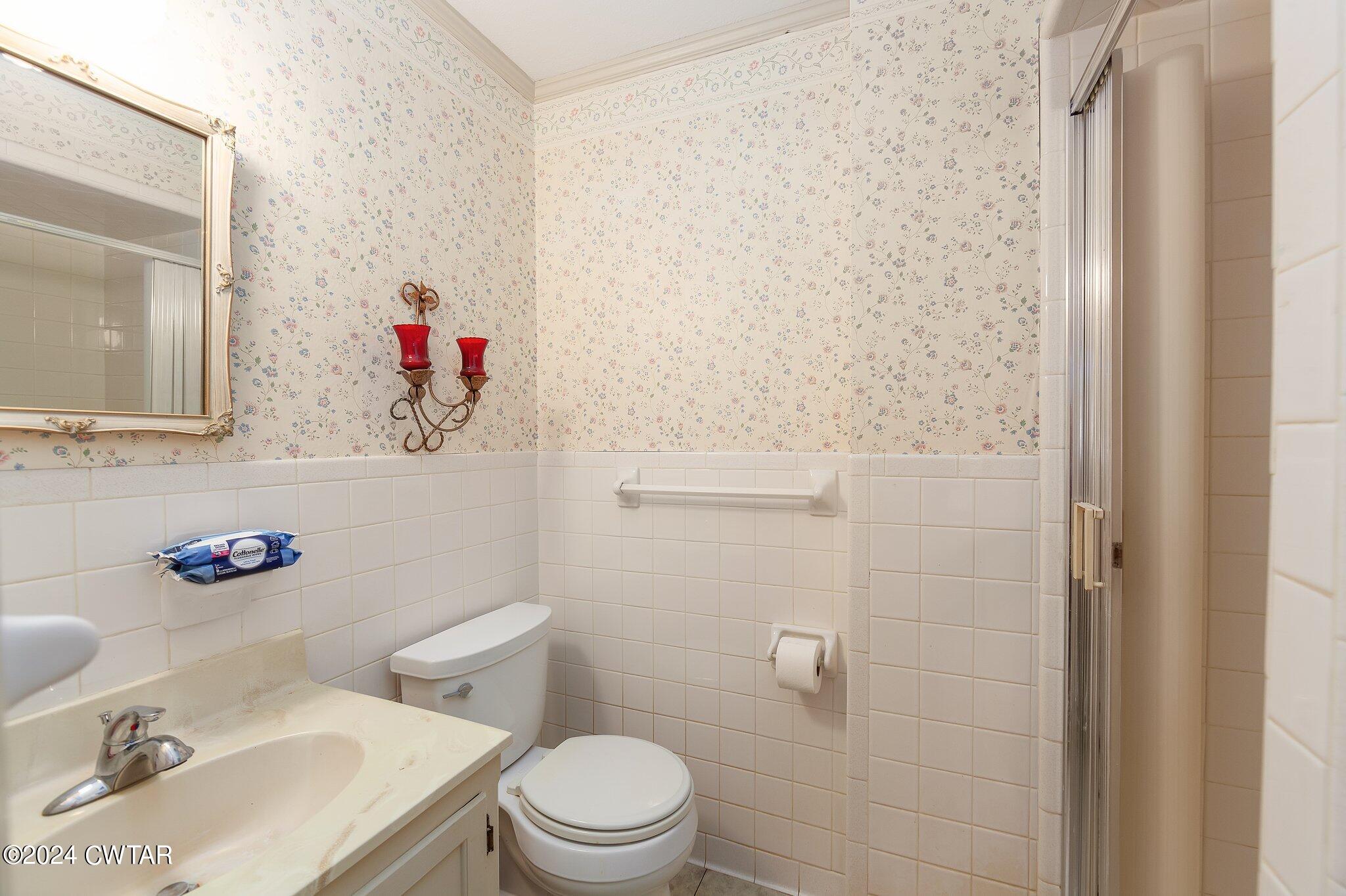 101 Hadley Drive Rutherford, TN 38369 - Photo 14 of 25 a bathroom with a sink toilet and shower