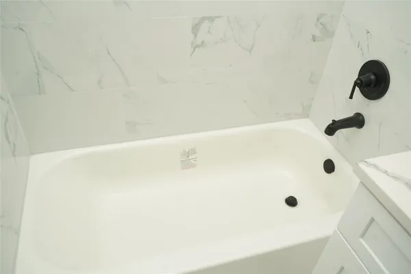 a bathroom with a bathtub