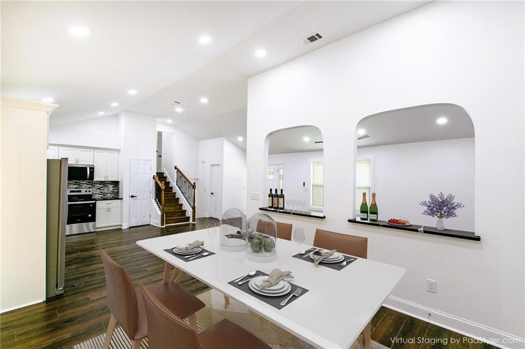 1241 Bethsaida Road Riverdale, GA 30296 - Photo 1 of 1 a view of a dining room with furniture