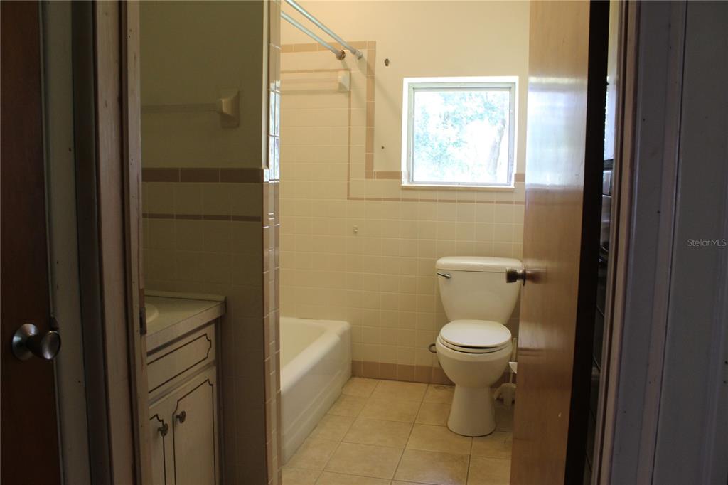407 Hunting Lodge Drive Inverness, FL 34453 - Photo 12 of 16 a bathroom with a toilet