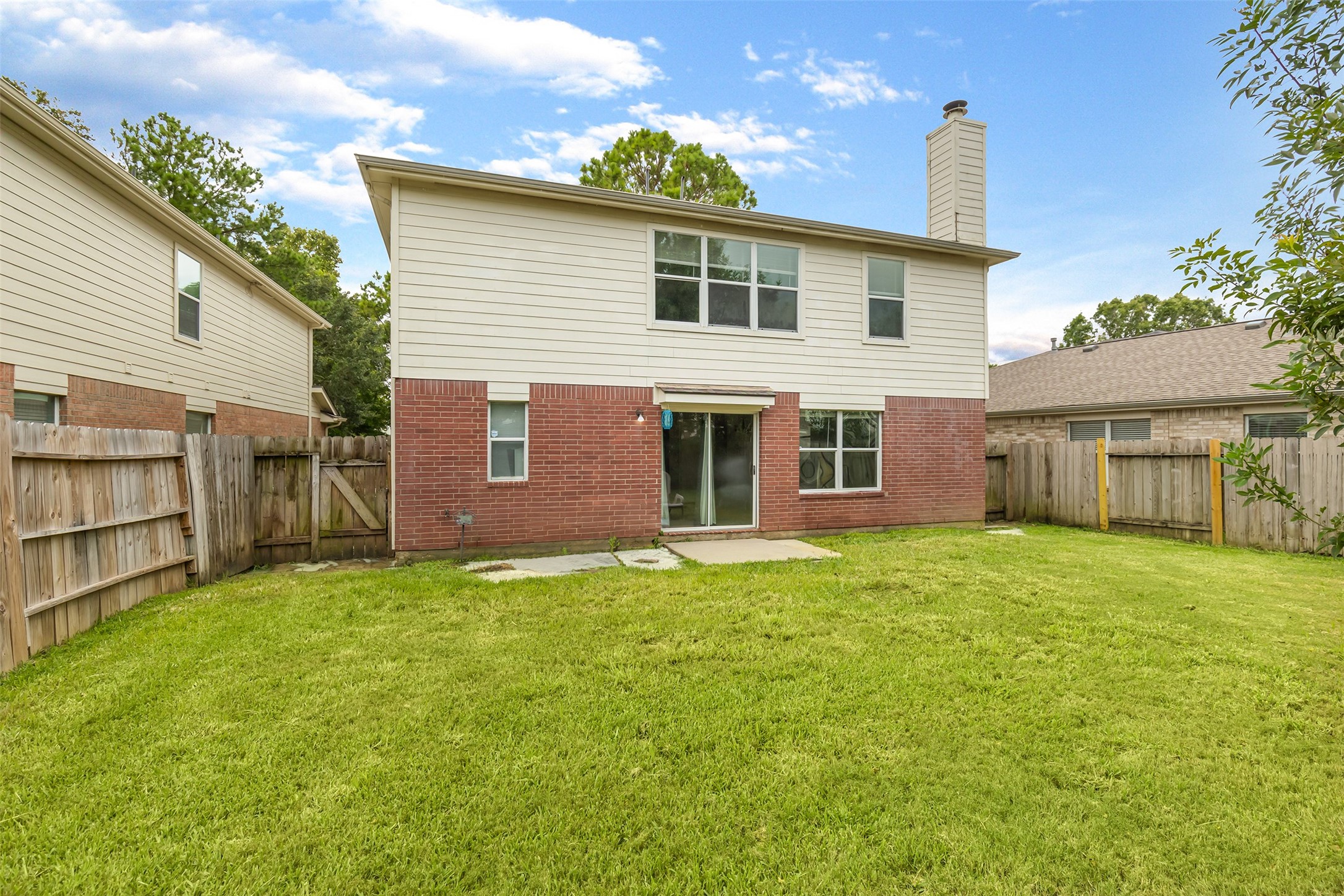 17334 Turquoise Stream Drive Houston, TX 77095 - Photo 30 of 31 a view of a house with a garden