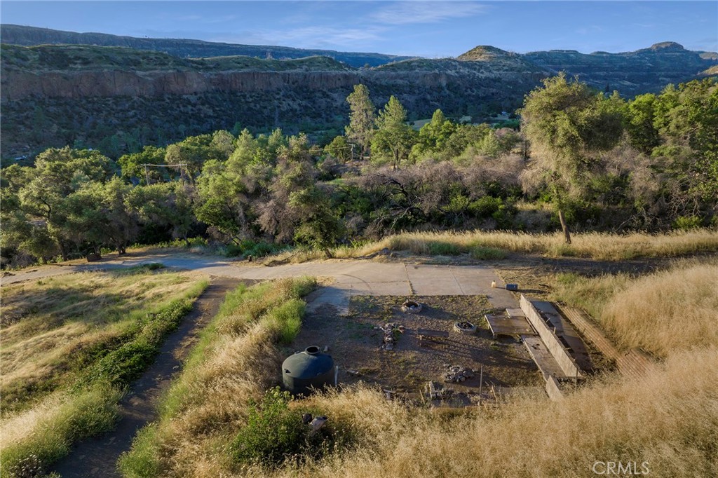 2470 Honey Run Road Chico, CA 95928 - Photo 31 of 71 a view of a lake with mountains in the background